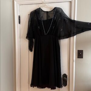 This dress doesn’t have tags but is in great shape it may be vintage.